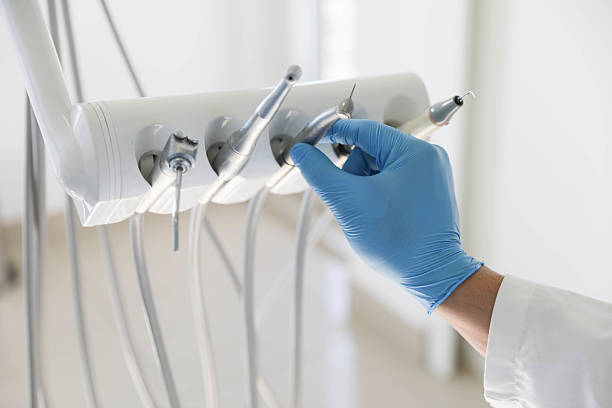 Professional Tooth Extraction technician working in West Canton, NC